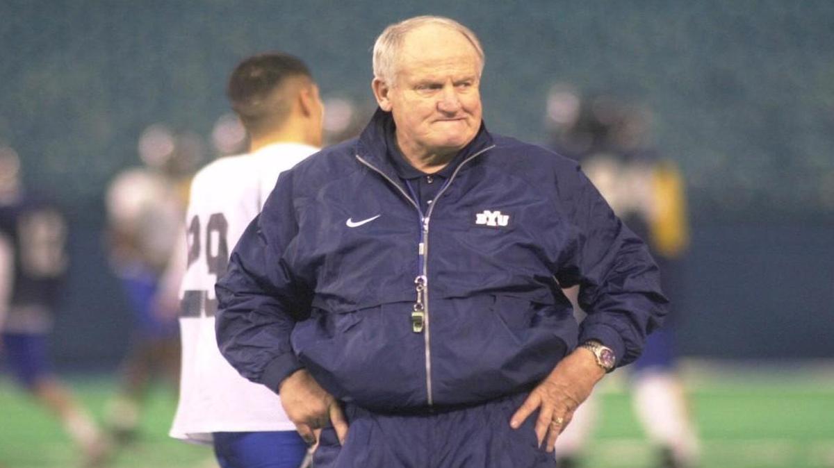 Brigham Young University head football coach LaVell Edwards watched his team practice in this Dec. 24, 1999 photo at the Silverdome in Pontiac, Mich. Edwards died Thursday.