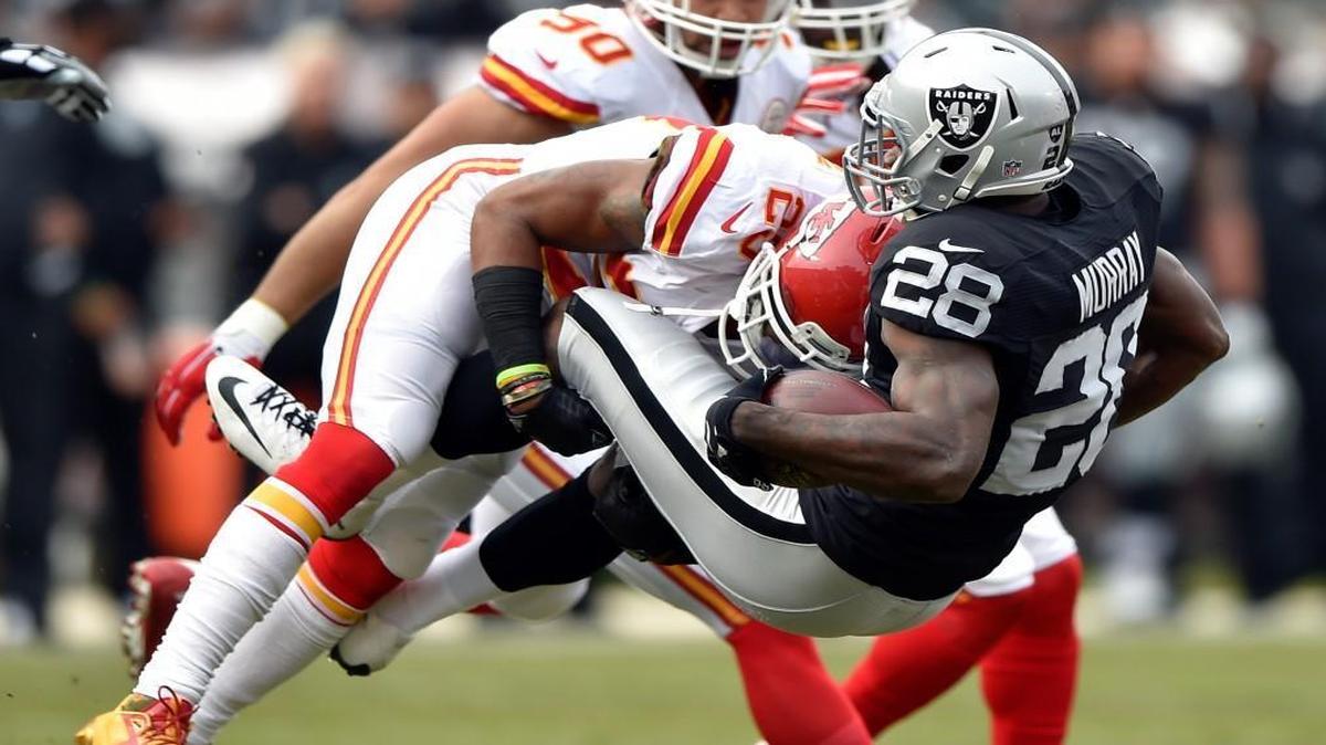 Kansas City Chiefs safety Eric Berry put a big hit on the Raiders’ Latavius Murray during the first quarter on Sunday at O.co Coliseum in Oakland, Calif.