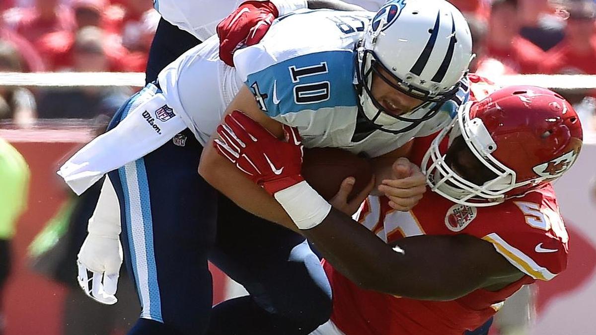 
Kansas City Chiefs outside linebacker Justin Houston sacked Tennessee Titans quarterback Jake Locker during a game last year.
