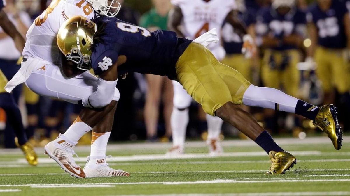 Notre Dame linebacker Jaylon Smith (right) starred in 2015, recording 114 tackles (nine for loss), one sack and six hurries in 13 games. But an injury during the Fiesta Bowl put his future in the NFL in question.