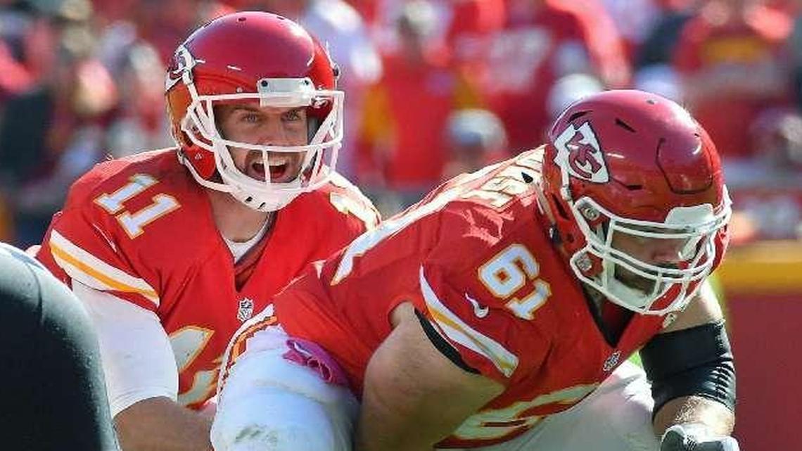 Center Mitch Morse (center) and the rest of the Chiefs’ offensive line kept quarterback Alex Smith from being sacked in Sunday’s game against the Saints at Arrowhead Stadium.