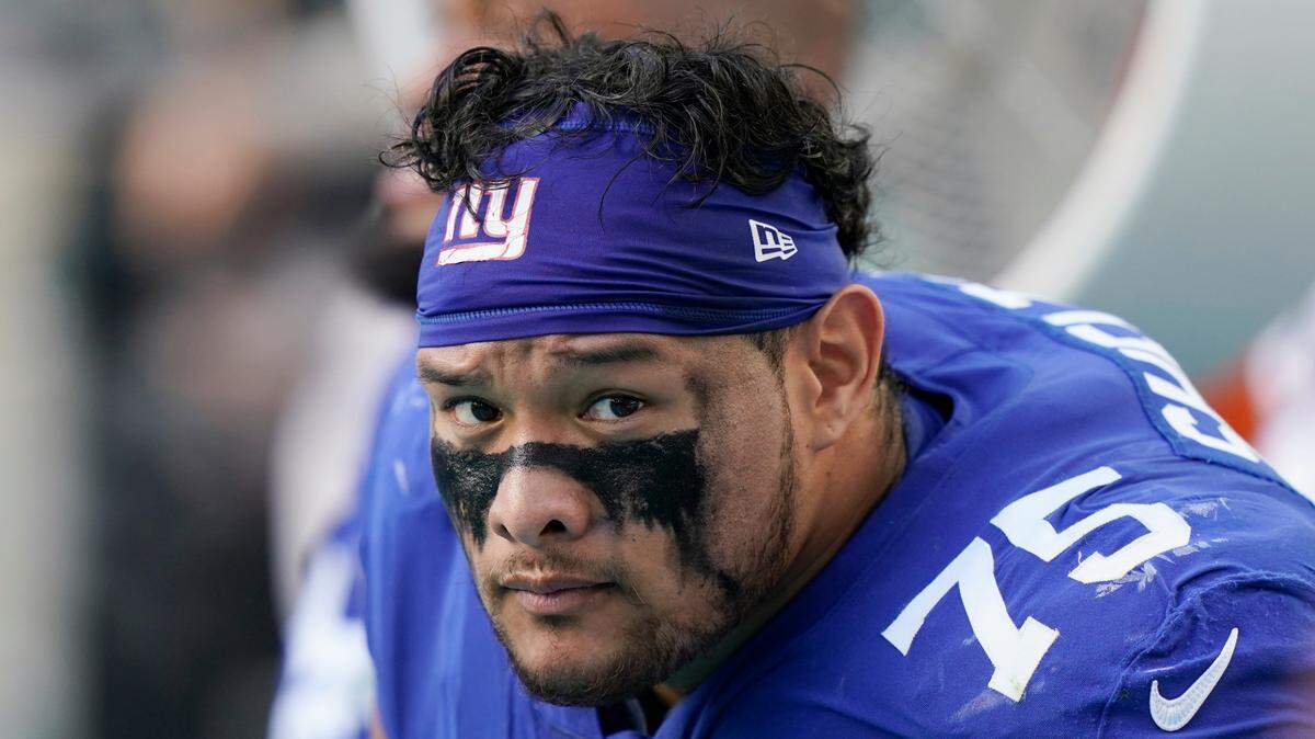 New York Giants defensive tackle Danny Shelton (75) sits on the sidelines during the second half of an NFL football game against the Miami Dolphins, Sunday, Dec. 5, 2021, in Miami Gardens, Fla.