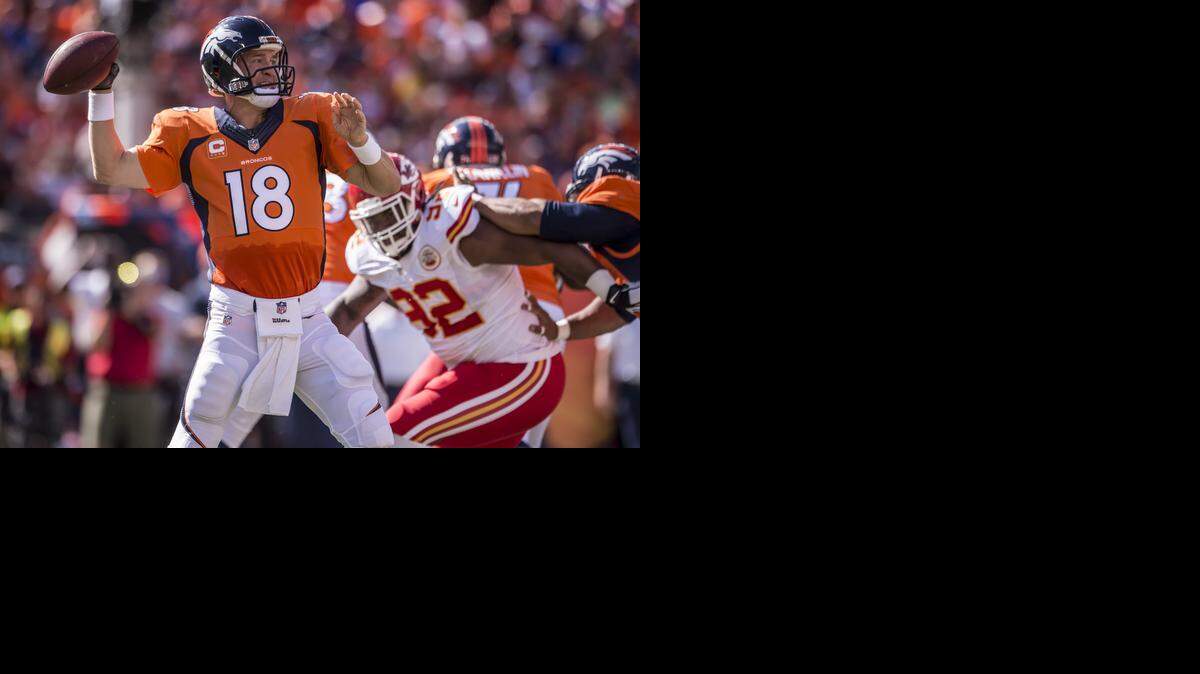 
Denver Broncos quarterback Peyton Manning (18) threw a pass against the Kansas City Chiefs in NFL action on September 14, 2014 at Sports Authority Field at Mile High in Denver, Co. The Chiefs lost 24-17.
