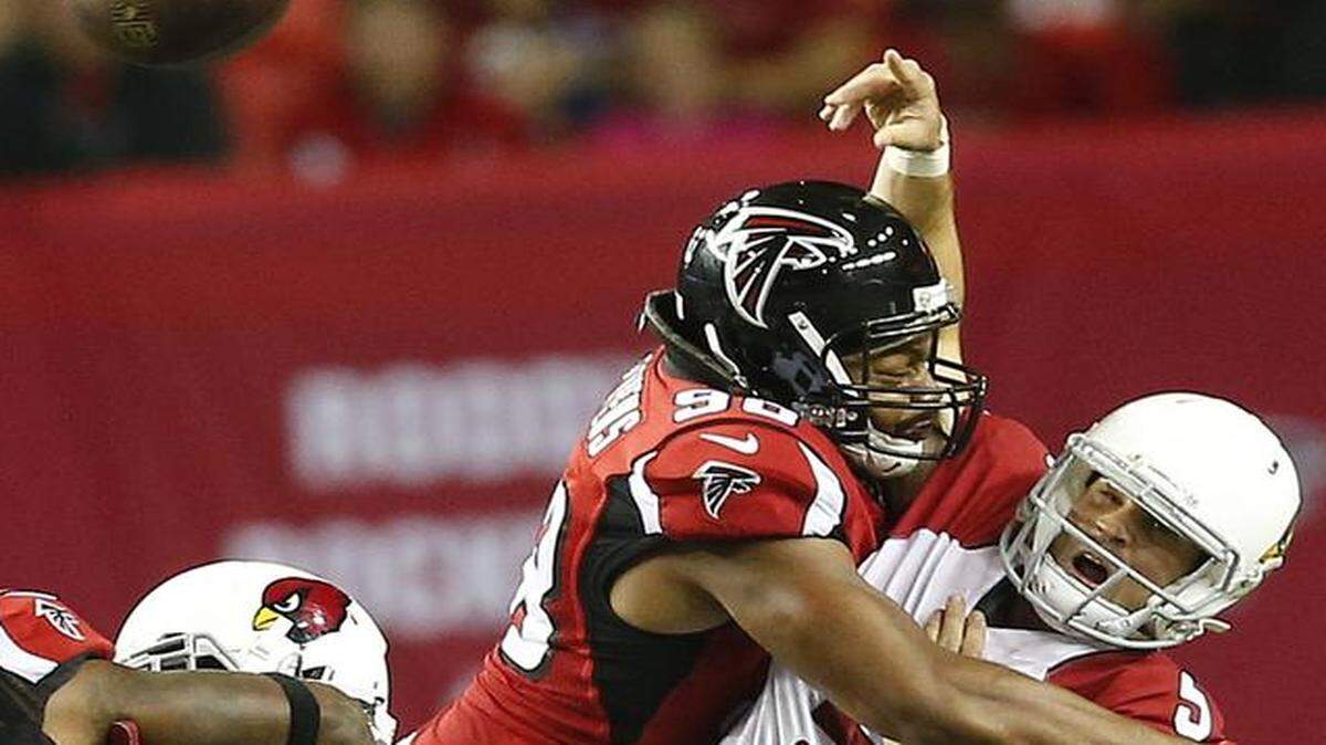 
Drew Stanton (right) hasn’t exactly shined in his new role as the Arizona Cardinals’ starting quarterback.
