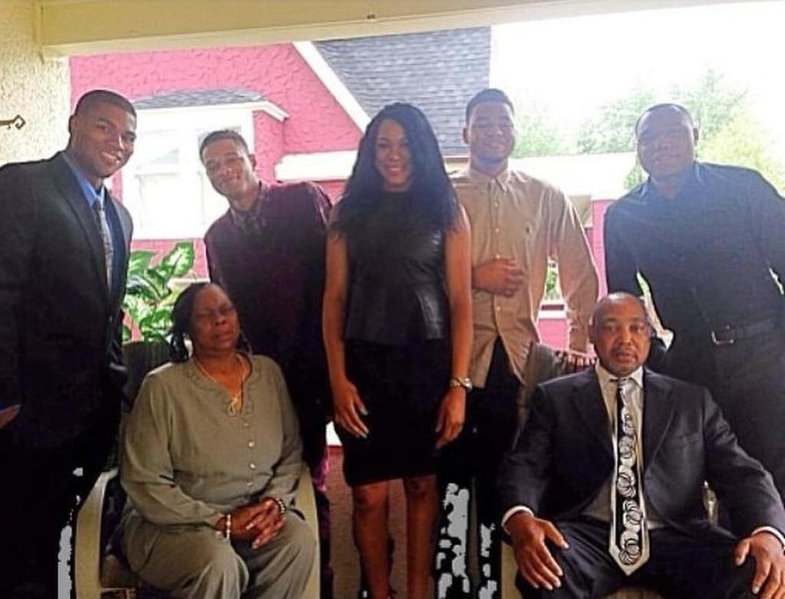 Justin March-Lillard and his siblings stand with their parents, Randy Lillard Sr. and Michelle Lillard.