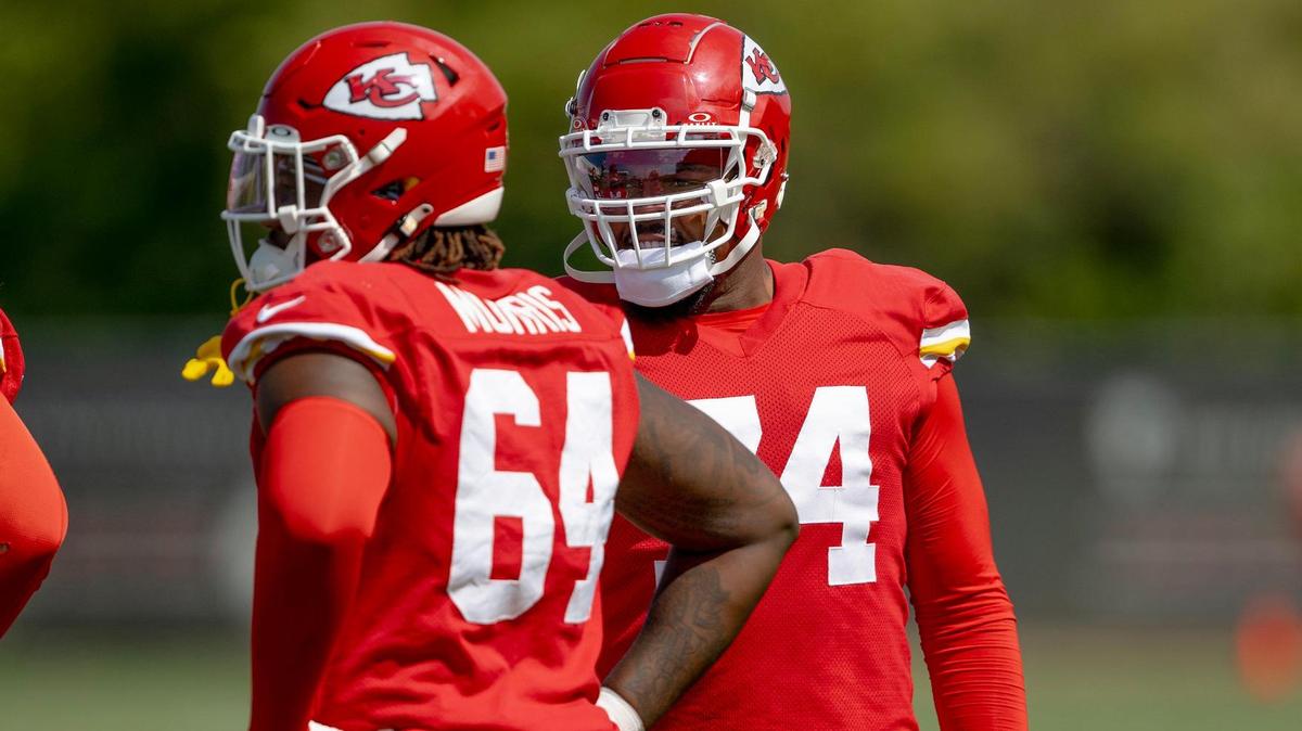 Kansas City Chiefs offensive tackle Jawaan Taylor (74) smiles after catching a pass during a team practice on Tuesday, Sept. 5, 2023, in Kansas City.