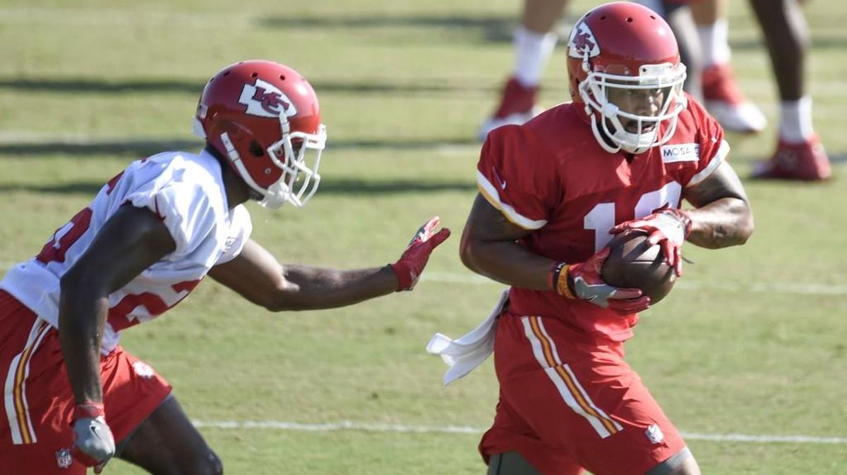 Chiefs wide receiver Albert Wilson (right) caught a pass in front of cornerback KeiVarae Russell at training camp in August.