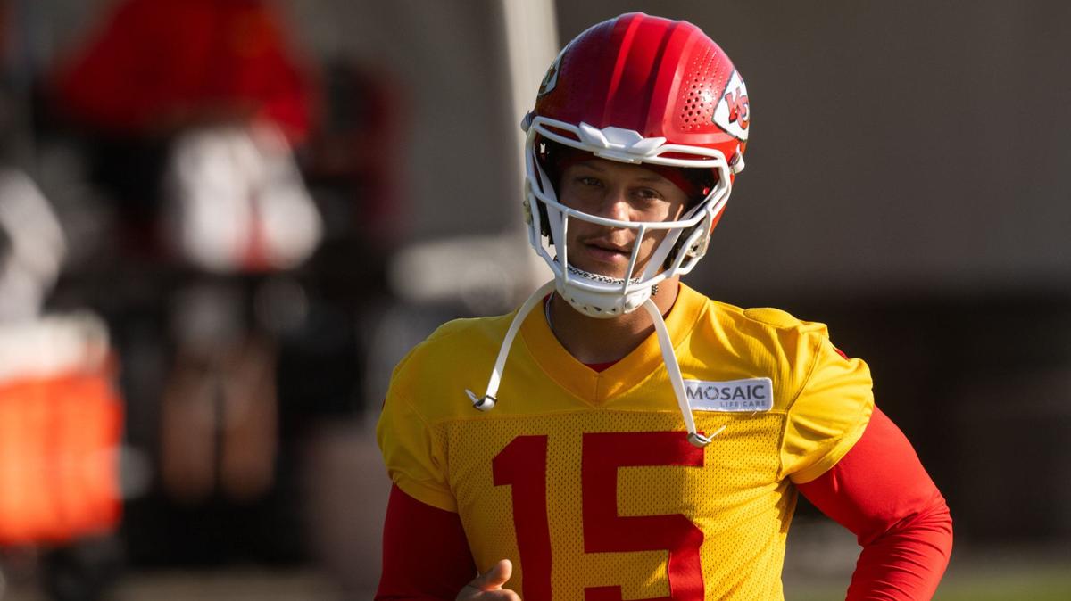 Kansas City Chiefs quarterback Patrick Mahomes (15) stretches before the last training camp practice of the season on Thursday, Aug. 15, 2024, in St. Joseph.