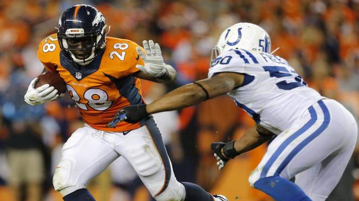 
Denver Broncos running back Montee Ball attempted to elude Indianapolis Colts inside linebacker Jerrell Freeman last Sunday.
