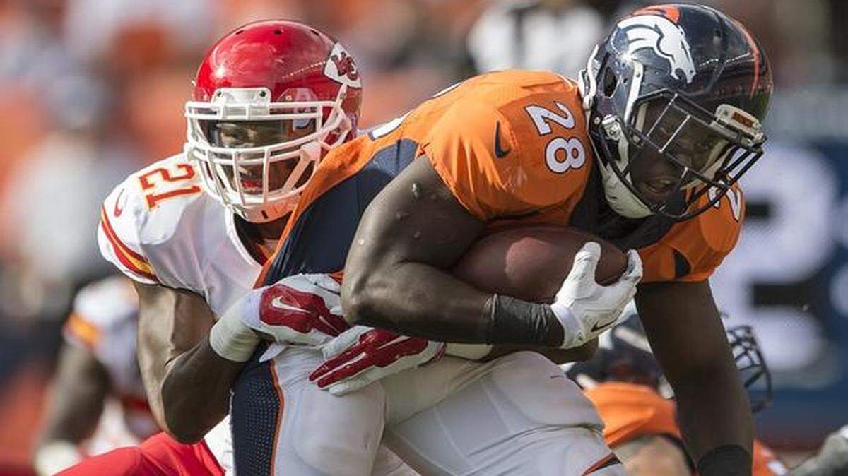 
Chiefs cornerback Sean Smith (21) tackled running back Montee Ball (28) in the Broncos’ 24-17 win over Kansas City on Sept. 14 in Denver. Sunday against the Dolphins, Smith was part of a secondary that shut down Miami in a convincing 34-15 road win at Sun Life Stadium.
