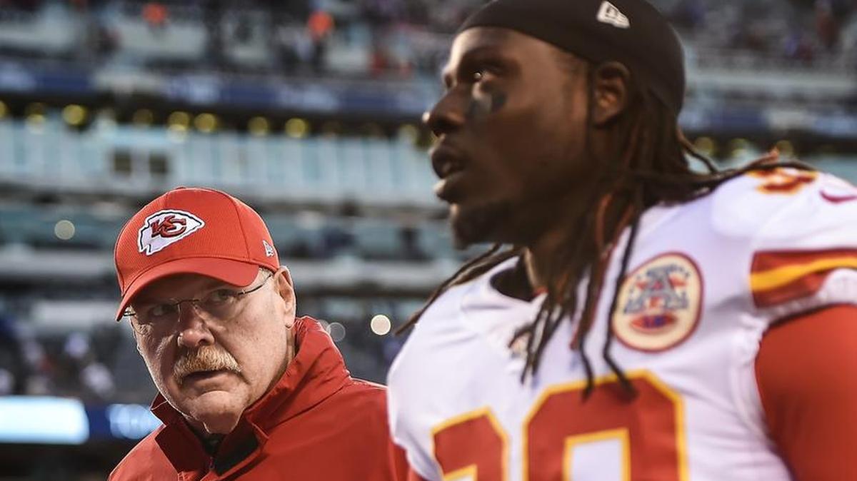Kansas City Chiefs head coach Andy Reid looked at Kansas City Chiefs free safety Ron Parker (38) as the two left the field after the 12-9 overtime loss to the New York Giants on November 19, 2017, at MetLife Stadium in East Rutherford, New Jersey.