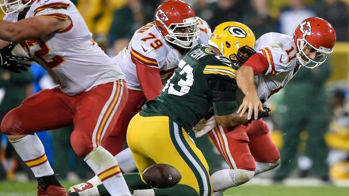 
Kansas City Chiefs quarterback Alex Smith fumbled the ball after being hit by Green Bay Packers outside linebacker Nick Perry in the fourth quarter on Monday. The Chiefs recovered the ball.
