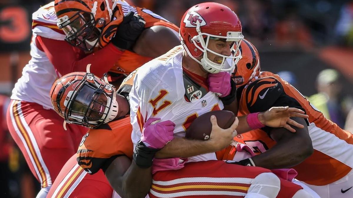 
Kansas City Chiefs quarterback Alex Smith was sacked by Cincinnati Bengals defensive end Carlos Dunlap and defensive tackle Geno Atkins in the third quarter on Sunday. The Bengals won, 36-21.

