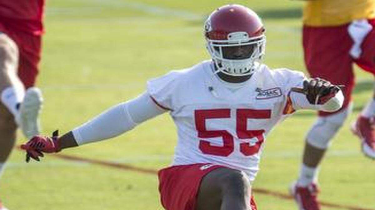 
Chiefs linebacker Dee Ford stretched with teammates Monday at training camp in St. Joseph.
