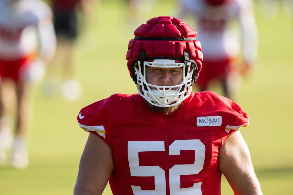 Kansas City Chiefs center Creed Humphrey (52) stretches before the last training camp practice of the season on Thursday, Aug. 15, 2024, in St. Joseph.