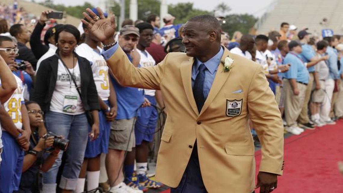 
Hall of Fame inductee Derrick Brooks waved to fans during the Pro Football Hall of Fame enshrinement ceremony Saturday in Canton, Ohio.

