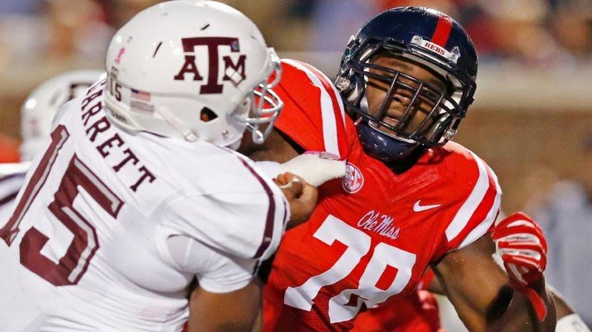 Mississippi’s Laremy Tunsil (right) is expected to be the first SEC player taken in the NFL Draft.