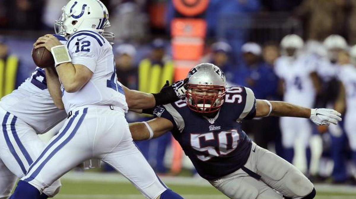 
New England Patriots defensive end Rob Ninkovich put pressure on Indianapolis Colts quarterback Andrew Luck during the AFC Championship Game.
