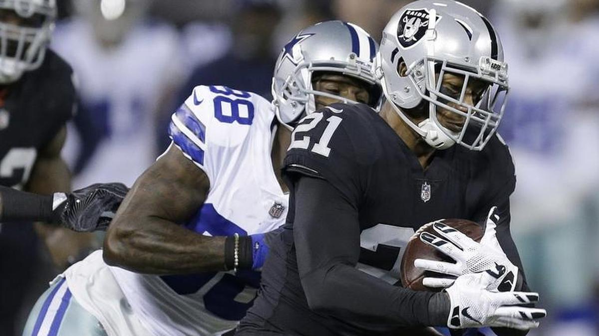 Oakland Raiders cornerback Sean Smith returned an interception against the Dallas Cowboys during Sunday’s game.