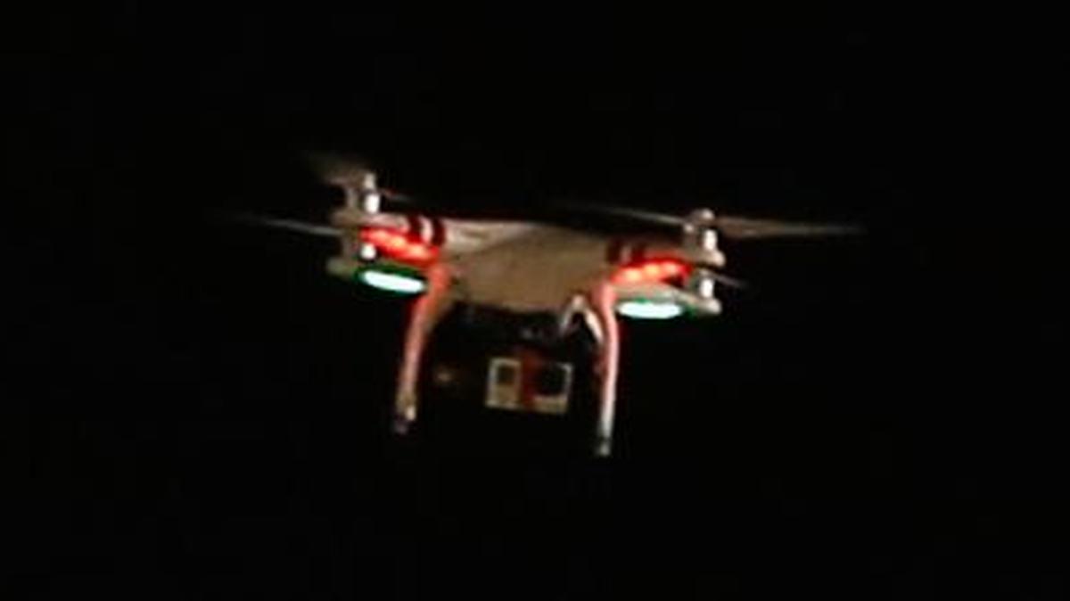 
A flying drone with a camera hanging from it flies over PNC Park during the baseball game between the Pittsburgh Pirates and the New York Mets on Thursday, June 26, 2014, in Pittsburgh. 

