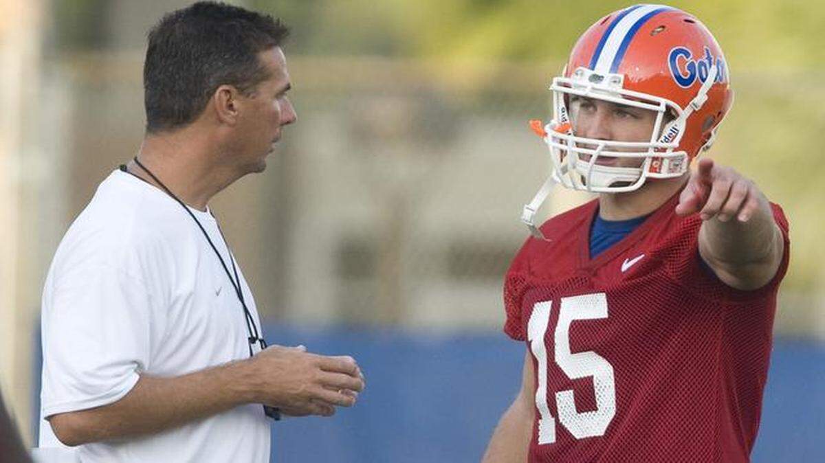 
At Florida, coach Urban Meyer and quarterback Tim Tebow (right) had great success.
