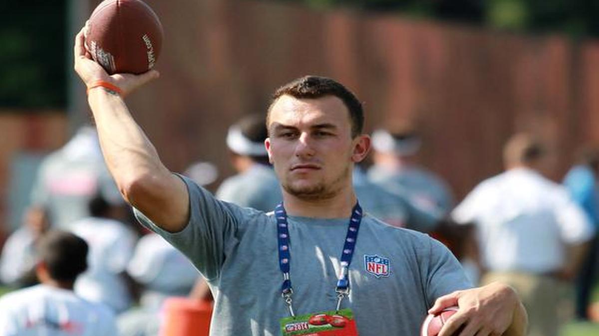 
Cleveland Browns' Johnny Manziel throws a pass during an NFL football Play 60 youth event at the Cleveland Browns practice facility Friday in Berea, Ohio.
