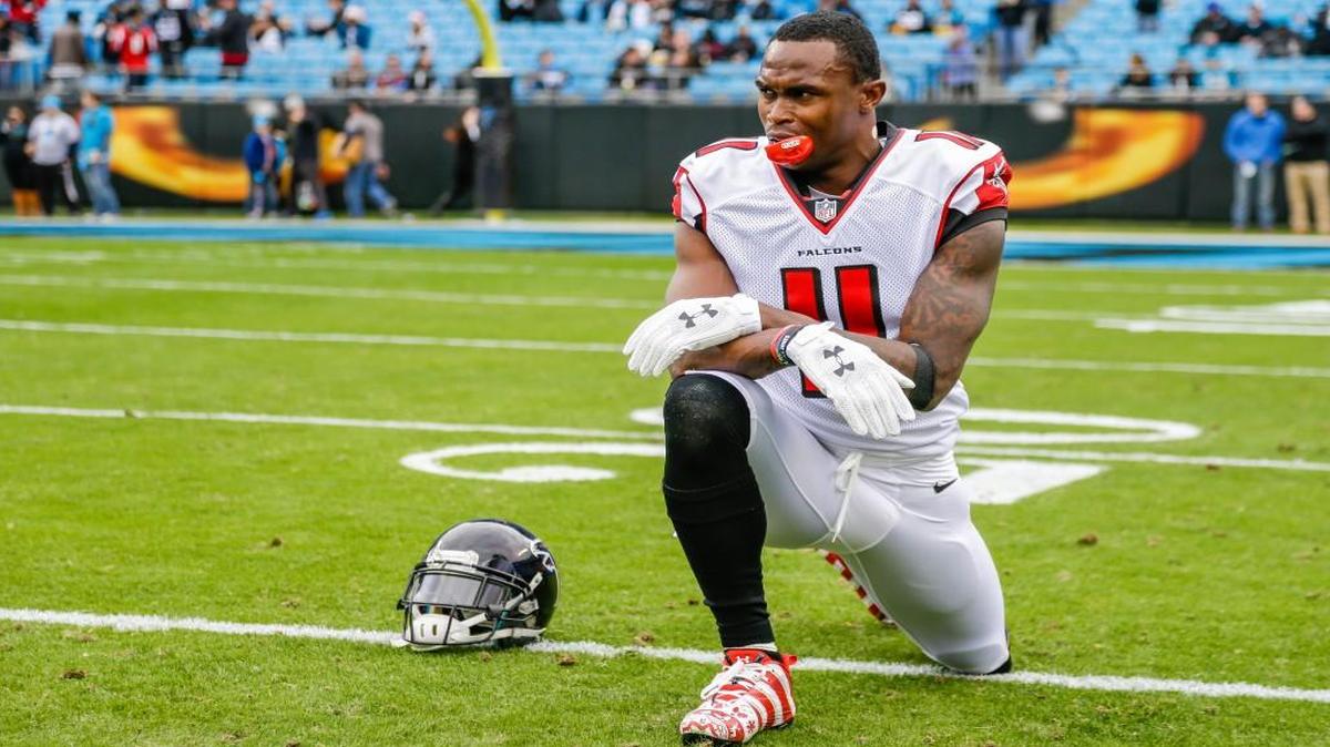 Falcons wide receiver Julio Jones stretches before a game against the Panthers in Charlotte, N.C., on Dec. 24, 2016. The Falcons won 33-16.
