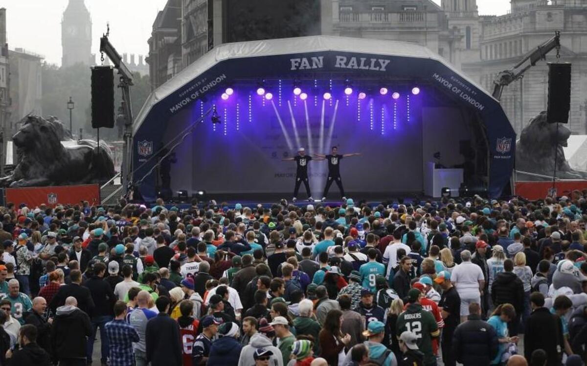 
London street dance duo Twist and Pulse perform on stage during an NFL fan rally in Trafalgar Square, in London, Saturday, Oct. 3, 2015. The Miami Dolphins are playing the New York Jets in an NFL football game at London's Wembley stadium on Sunday.
