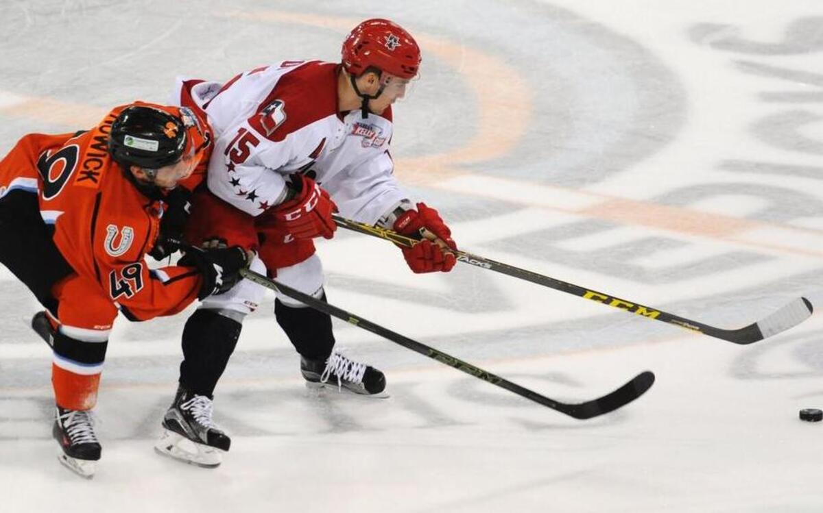 Missouri Mavericks forward Darren Nowick (left) played defense against Allen Americans left wing Greger Hanson during the third period of their ECHL Game 2 of the Western Conference semifinals on April 30, 2016, at Silverstein Eye Centers Arena. The Mavericks won the game, 5-2.