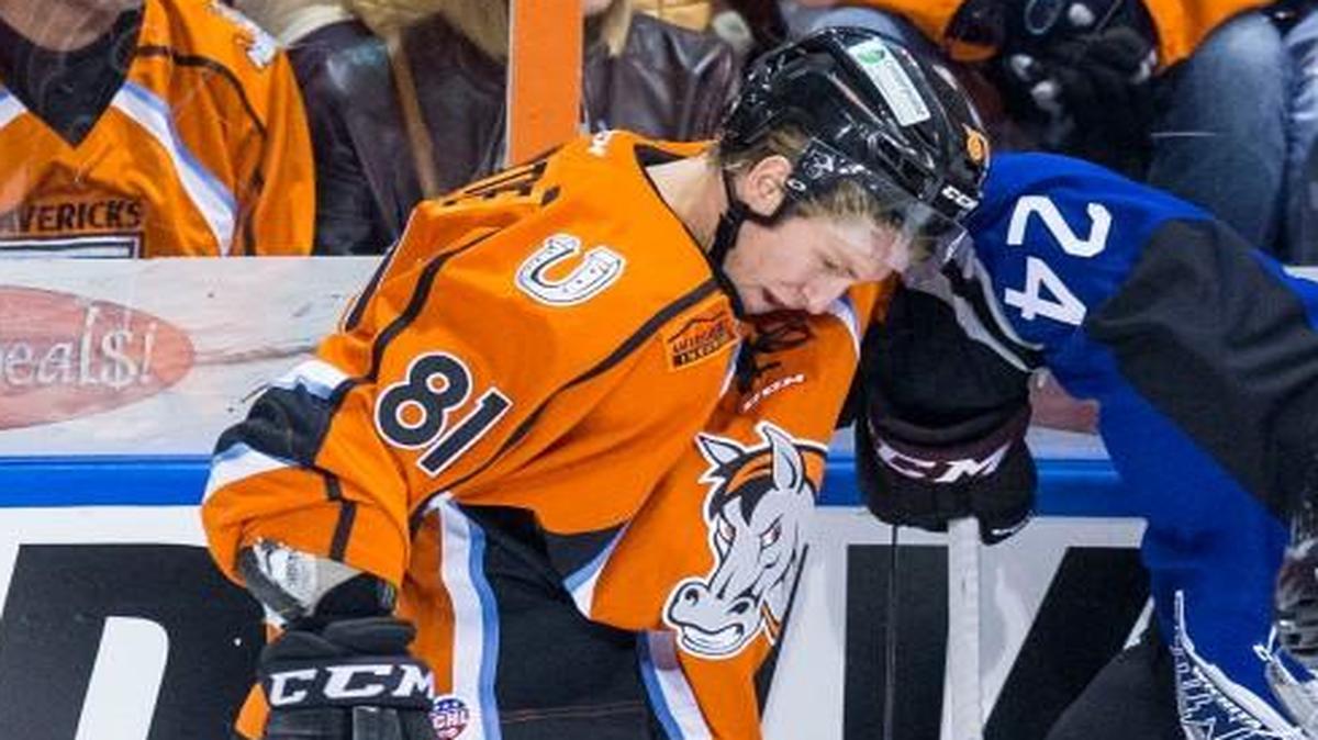 The Mavericks’ Sebastien Sylvestre (left) battled for the puck with the Thunder’s Theo Peckham and Joey Sides (right) in Saturday’s game at the Silverstein Eye Centers Arena.