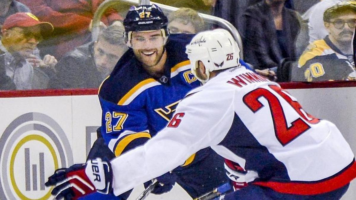 St. Louis Blues defender Alex Pietrangelo (left) knocked the puck away from Washington Capitals forward Daniel Winnik during a 2016 exhibition game at Kansas City’s T-Mobile Center (formerly the Sprint Center).