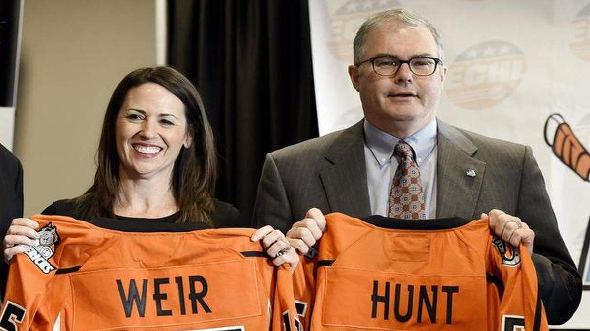 
As Lamar Hunt Jr. (right) became owner of the Missouri Mavericks hockey team, he and Independence Mayor Eileen Weir held up team jerseys at a February news conference at the Independence Events Center.
