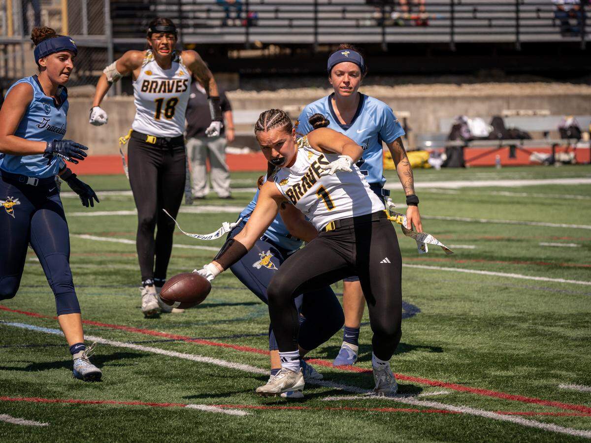 Junior wide receiver Marley Spielberg reaches the ball out in the KCAC tournament against Graceland University. The Las Vegas-area native is one of 12 all-conference players on this year’s team.