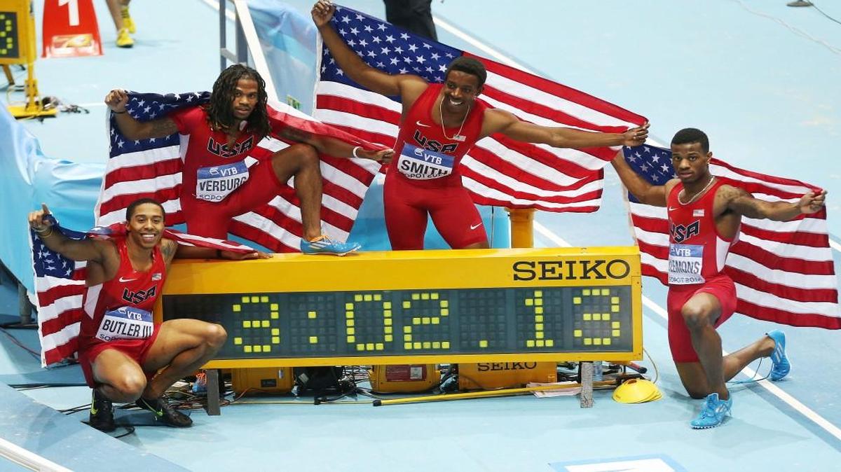 Kyle Clemons (right) was part of the 1,600-meter relay team that set a world record at the Athletics World Indoor Championships in Poland in 2014. The other members were, from left, Kind Butler, David Verburg and Calvin Smith.