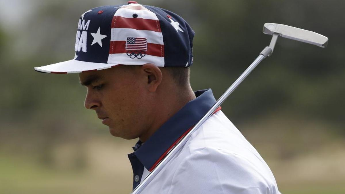 Rickie Fowler walked off the second green wearing a Team USA cap during a practice round for the men’s golf event at the 2016 Summer Olympics in Rio de Janeiro, Brazil.