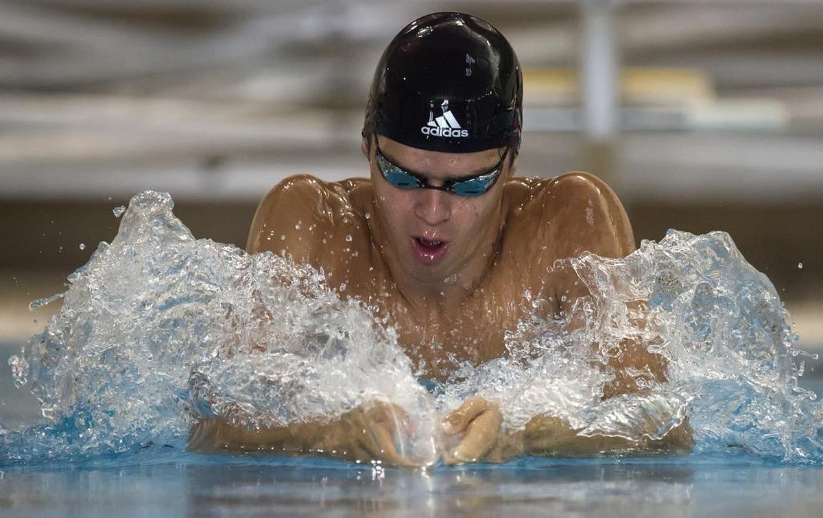Michael Andrew, a 16-year-old professional swimmer who lives just outside of Lawrence with his family, is training with the eventual goal of qualifying for the 2016 Rio Olympic Games. Andrew, who normally trains at a 25-meter, two-lane pool built at his home, was training at the Lawrence Aquatic Center.