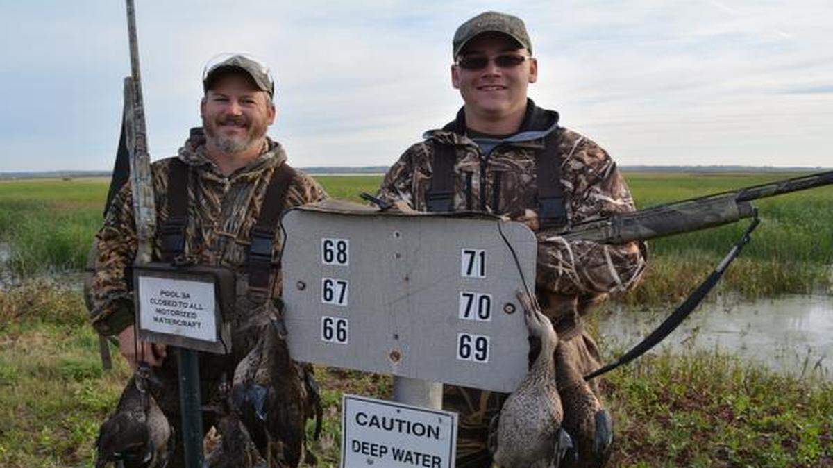 
Steve Redlin and his son Steven (from left) of Ottawa, Kan., were among the hunters who shot limits of ducks on opening weekend of the the season at the Cheyenne Bottoms Wildlife Area.
