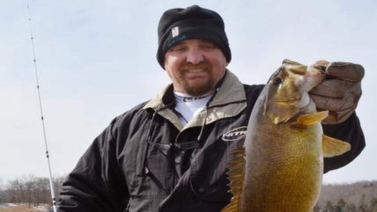 
Mike Webb, a guide at Table Rock Lake, knows that big bass such as this smallmouth can be caught from the depths of the Ozarks reservoir, especially in the winter.
