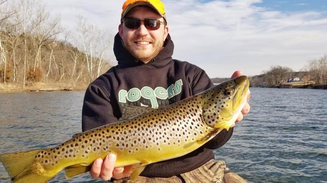 The author, Tyler Mahoney, caught this beautiful brown trout this past week down at Lake Taneycomo.