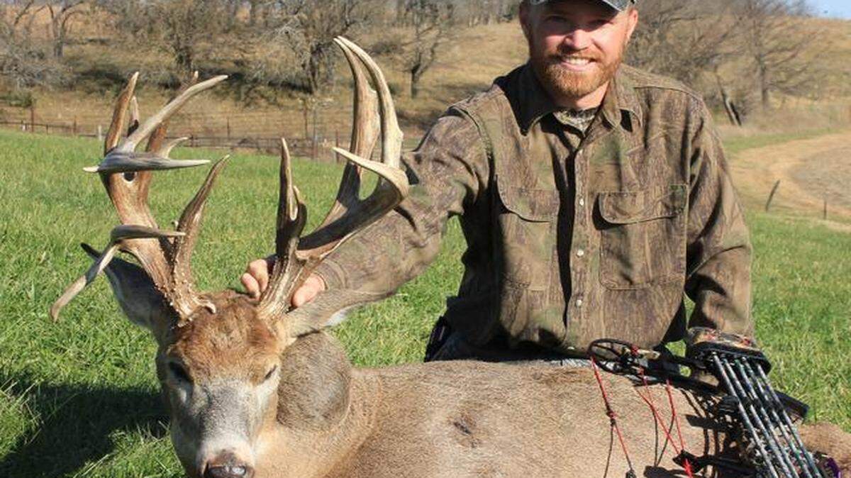 
Nick Simon posed with the monster buck he took with his bow Monday north of Topeka.

