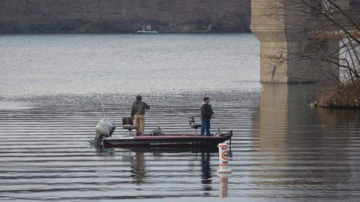 
Two fishermen cast for trout on opening day of the fishing season at Wyandotte County Lake in Kansas City, Kan.

