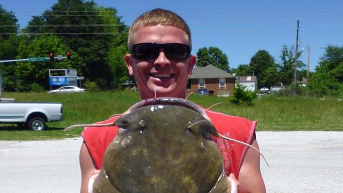 
Jarrod Powell strained to lift the 66-pound flathead catfish he caught recently on the Missouri River near downtown Kansas City.
