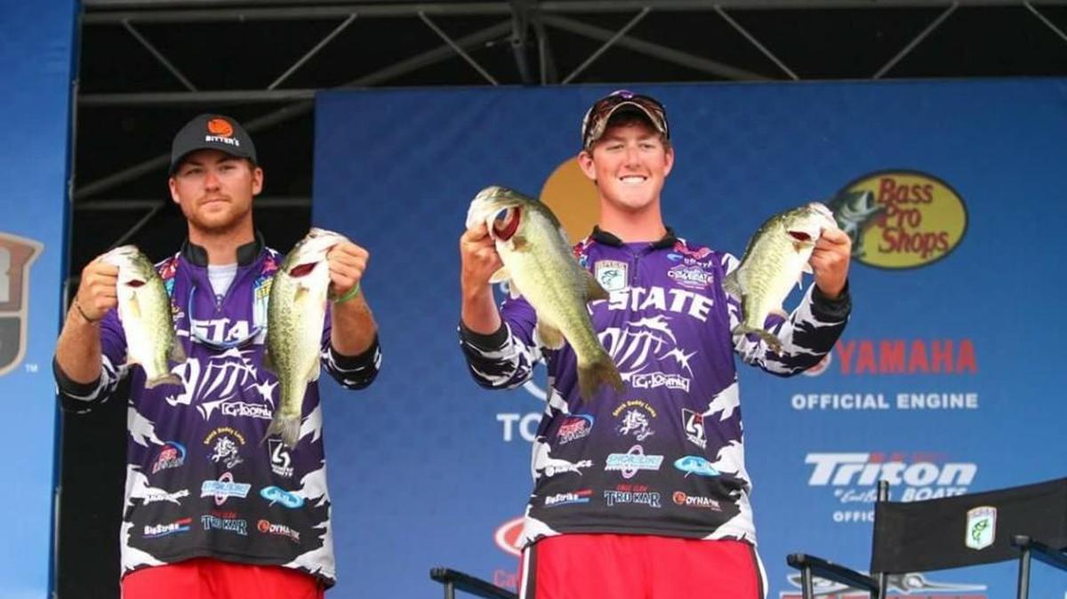 Senior Sheldon Rogge (right) and sophomore Parker Davis show off their catch.