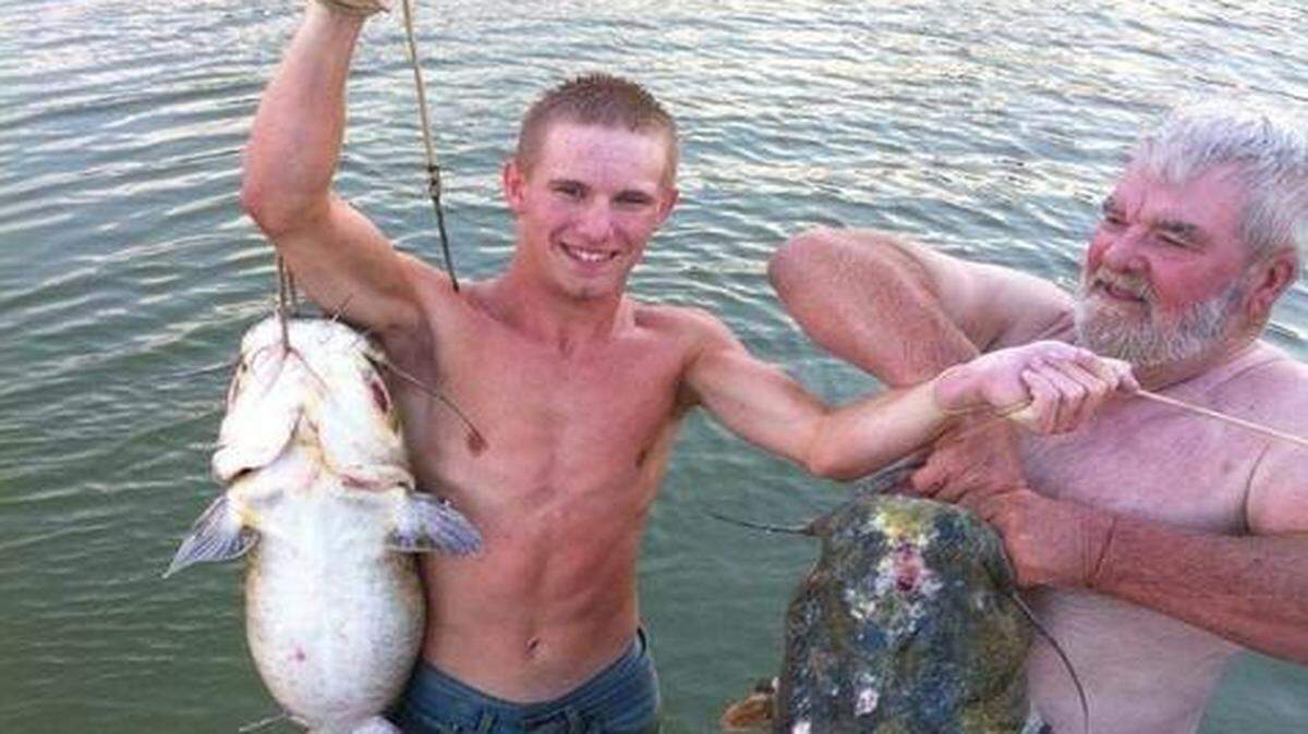 
Gary Webb (right) and Cole Anderson showed off their catch after noodling in a Texas reservoir.
