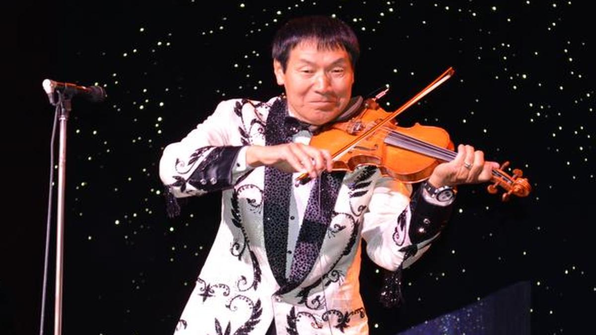 
Shoji Tabuchi, who also enjoys trout fishing, played his fiddle last Sunday night during a performance at his theater in Branson.
