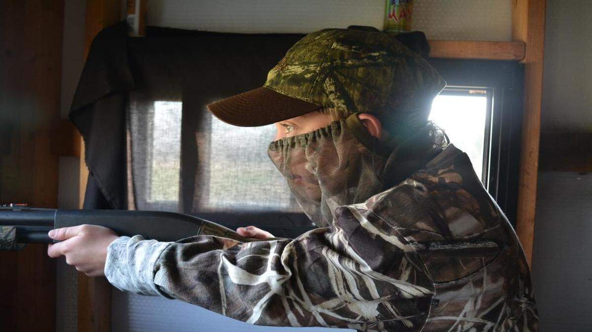 
Matt Watson, 9, concentrated as he prepared to shoot at a group of turkeys last weekend at the Beau Arndt Memorial Youth Turkey Hunt in Americus, Kan. Although he missed, Matt said he’s looking forward to coming back and trying again. 
