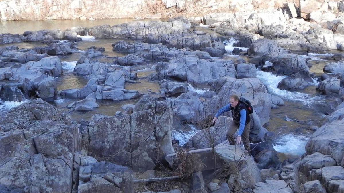 In this file photo from 2011, Bill Bryan, director of Missouri State Parks, explores the shut-ins at Missouri’s Johnson’s Shut-Ins State Park.