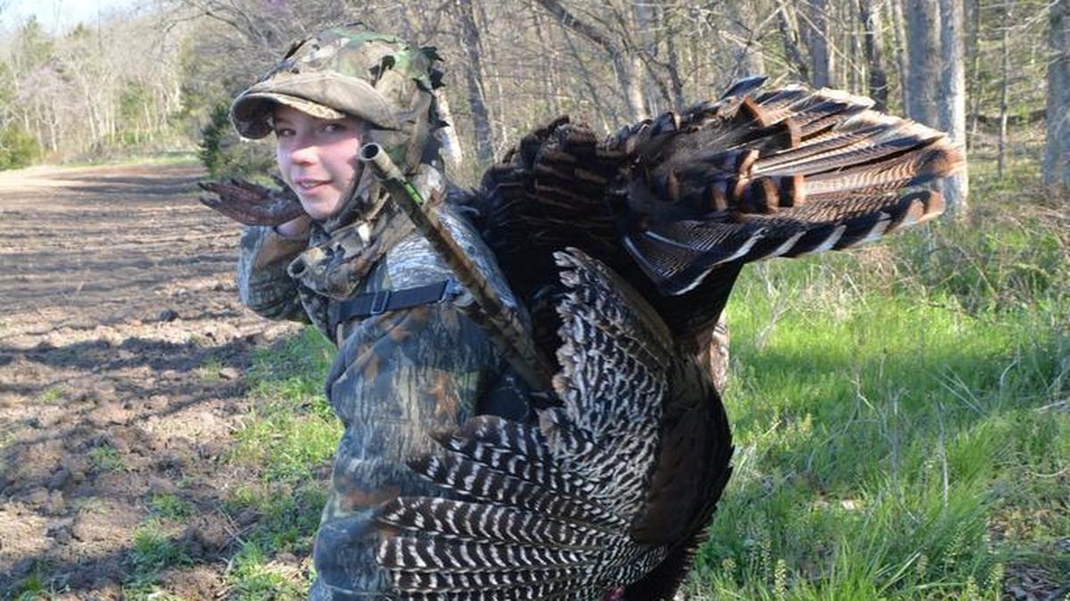 Dean Wright, 12, carried a big bird out of the woods last weekend after participating in his first turkey hunt.