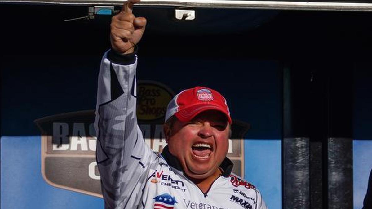 
James Watson (center) of Nixa, Mo., celebrated after learning that he had the winning weight in the Bassmaster Central Open at Table Rock Lake from Oct. 1-3.
