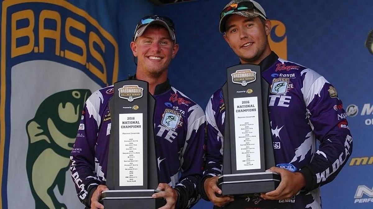 Kyle Alsop (left) and Taylor Bivins of Kansas State University held trophies Saturday after winning the 2016 Carhartt Bassmaster College Series National Championship in Campbellsville, Ky.